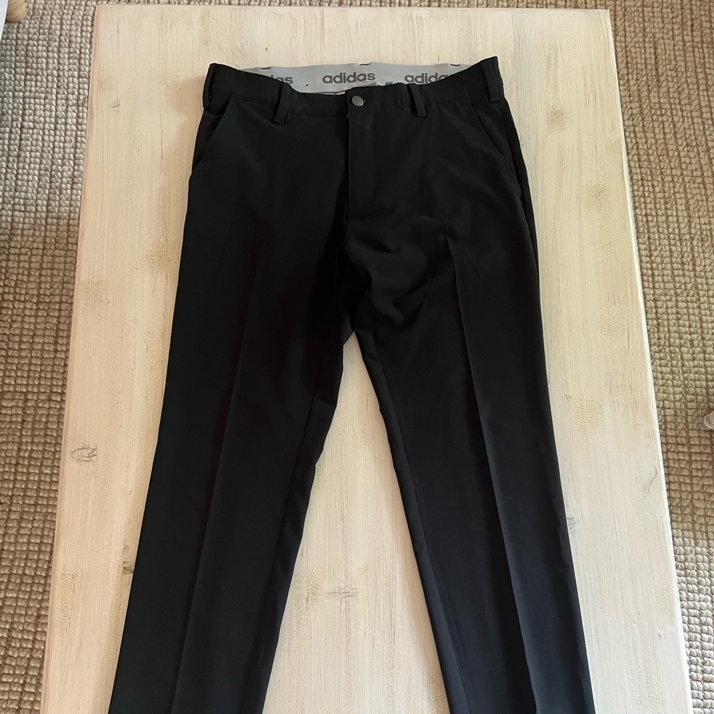 Slim fitting black Adidas mens golf pant, hardly worn. Size 30x32